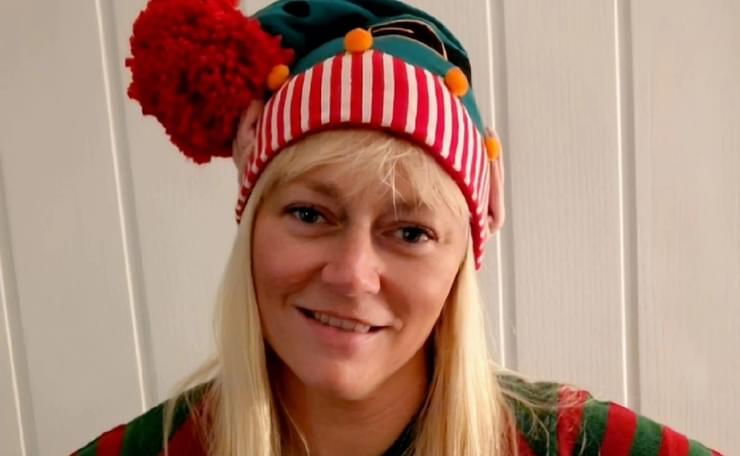 Our fundraising manager Carrie wearing an elf hat