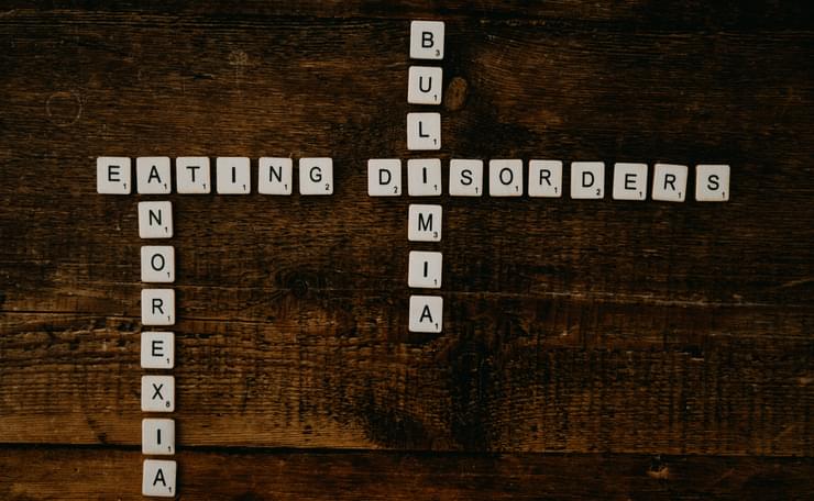 Scrabble letters, spelling out eating disorders, anorexia and bulimia