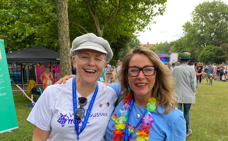 Two smiling West Sussex Mind supporters at a summer event